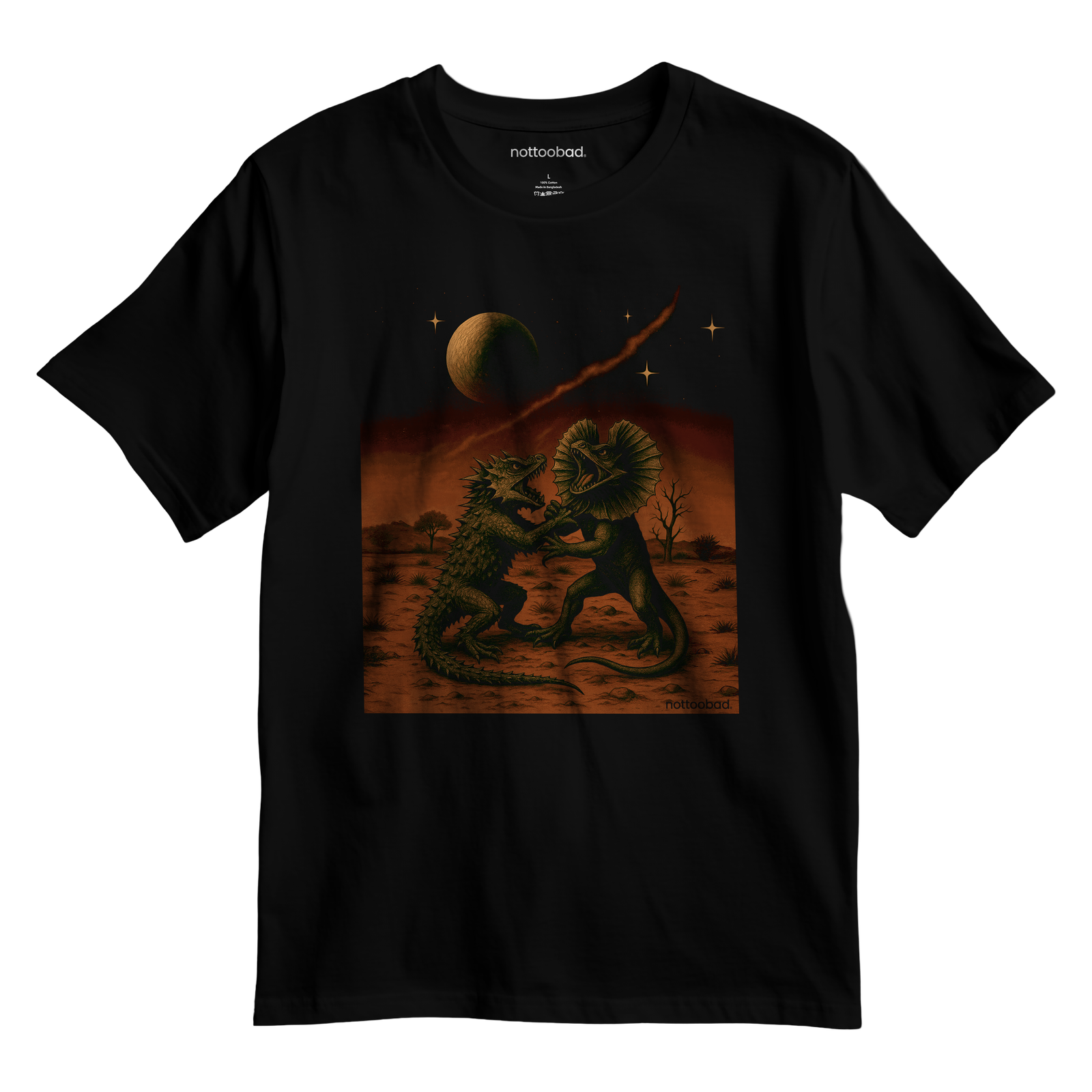 Black nottoobad® t-shirt flat lay with "Outback Battle" artwork showing two Aussie lizards fighting in a dusty outback landscape under a dramatic moonlit sky.